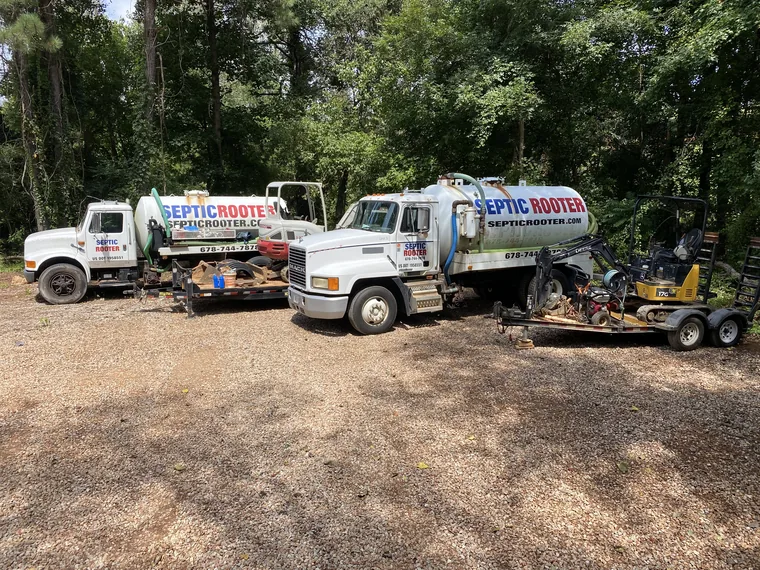 Multiple SepticRooter pump trucks and equipment staged for Savannah calls